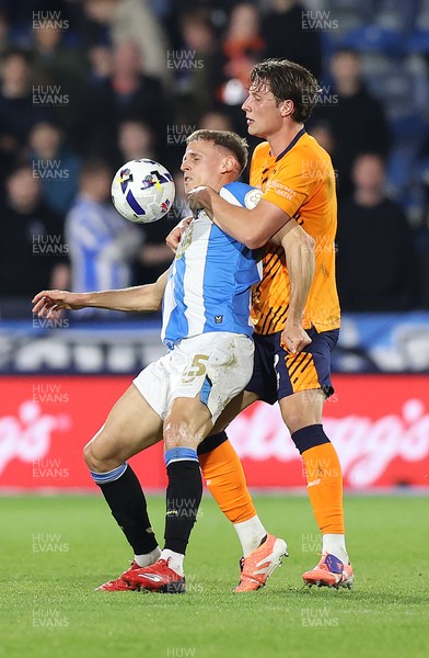 140426 - Huddersfield Town v Cardiff City - Sky Bet League 1 - Will Fish of Cardiff and Dion Charles of Huddersfield