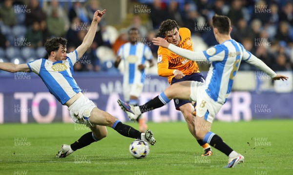 140426 - Huddersfield Town v Cardiff City - Sky Bet League 1 - Ollie Tanner of Cardiff and Sean Roughen of Huddersfield and Cameron Humphreys of Huddersfield