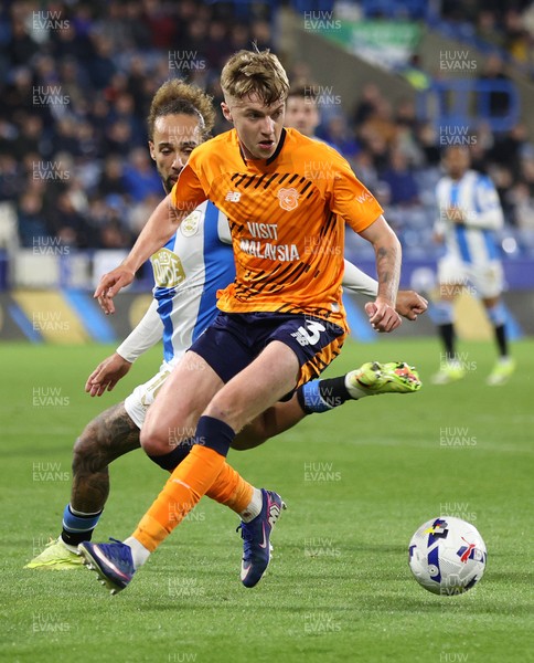 140426 - Huddersfield Town v Cardiff City - Sky Bet League 1 - Joel Bagan of Cardiff and Marcus Harness of Huddersfield