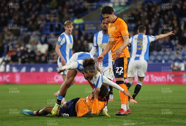 140426 - Huddersfield Town v Cardiff City - Sky Bet League 1 - Omari Kellyman of Cardiff and Marcus Harness of Huddersfield tussle