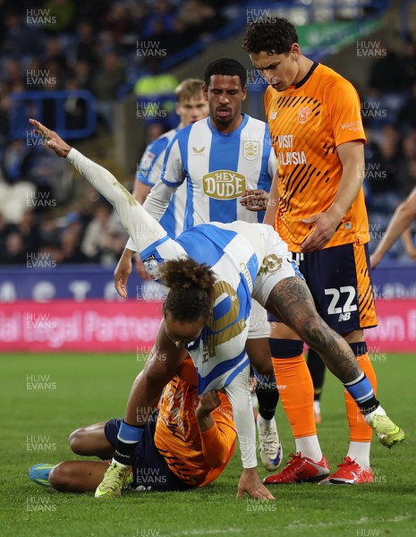140426 - Huddersfield Town v Cardiff City - Sky Bet League 1 - Omari Kellyman of Cardiff and Marcus Harness of Huddersfield tussle
