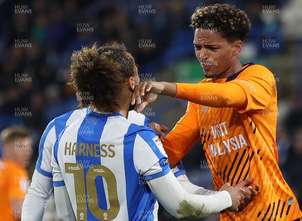 140426 - Huddersfield Town v Cardiff City - Sky Bet League 1 - Omari Kellyman of Cardiff and Marcus Harness of Huddersfield tussle