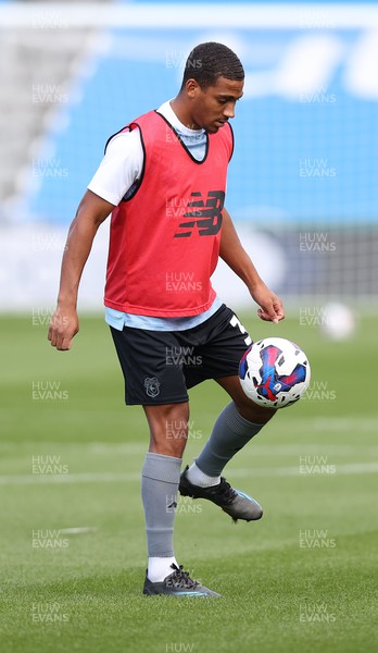 170922 - Huddersfield Town v Cardiff City - Sky Bet Championship - Andy Rinomhota of Cardiff warms up