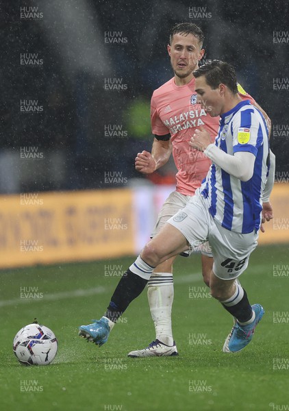 230222 - Huddersfield Town v Cardiff City - Sky Bet Championship - Will Vaulks of Cardiff has ball removed by Carel Eiting of Huddersfield