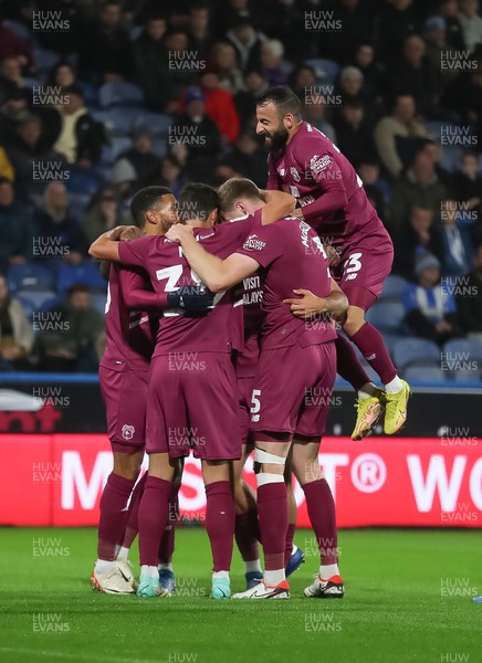241022 - Huddersfield Town v Cardiff City - Sky Bet Championship - Manolis Siopis celebrates with team mates 