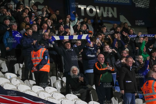 241022 - Huddersfield Town v Cardiff City - Sky Bet Championship - Cardiff fans celebrate a goal 