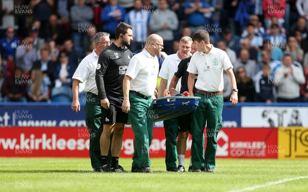 250818 - Huddersfield Town v Cardiff City - Premier League - Nathaniel Mendez-Laing of Cardiff City is taken off the field injured on a stretcher