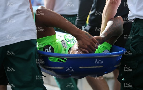 250818 - Huddersfield Town v Cardiff City - Premier League - Nathaniel Mendez-Laing of Cardiff City is taken off the field injured on a stretcher