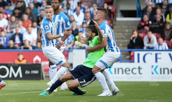 250818 - Huddersfield Town v Cardiff City - Premier League - Harry Arter of Cardiff City is taken down by Jonathan Hogg of Huddersfield Town which results in a red card