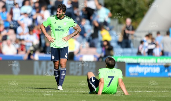 250818 - Huddersfield Town v Cardiff City - Premier League - Dejected Sean Morrison and Harry Arter of Cardiff City at full time