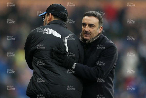100318 - Huddersfield Town v Swansea City - Premier League - Swansea City Manager Carlos Carvalhal shakes hands with Huddersfield Manager David Wagner at full time
