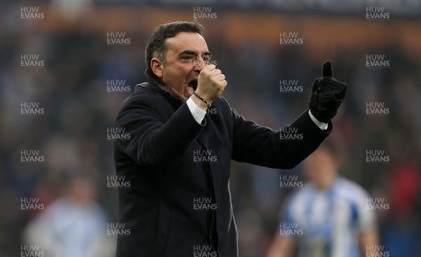 100318 - Huddersfield Town v Swansea City - Premier League - Swansea City Manager Carlos Carvalhal celebrates at full time