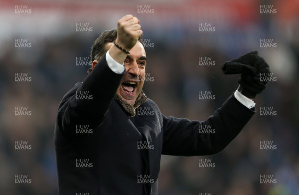 100318 - Huddersfield Town v Swansea City - Premier League - Swansea City Manager Carlos Carvalhal celebrates at full time