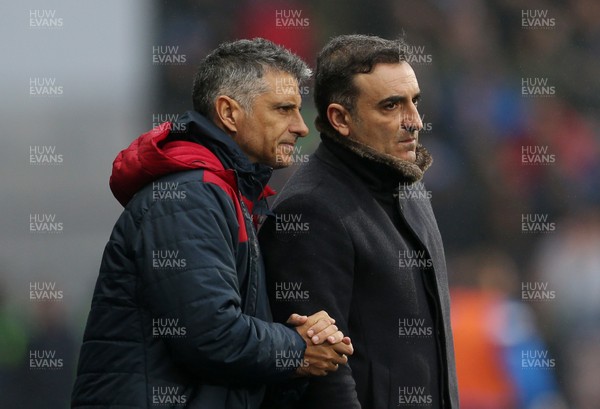 100318 - Huddersfield Town v Swansea City - Premier League - Coach Joao Mario with Swansea City Manager Carlos Carvalhal