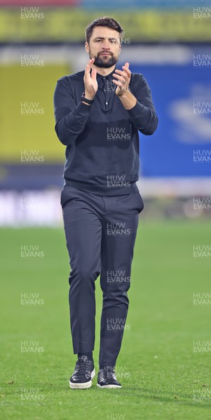 121122 - Huddersfield Town v Swansea City - Sky Bet Championship - Head Coach Russell Martin  of Swansea applauds the fans at the end of the match