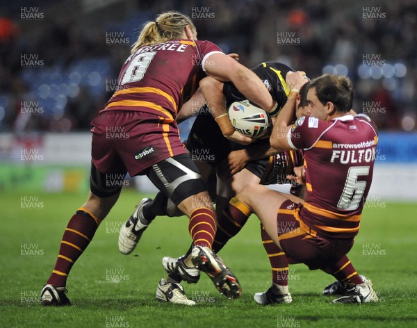 10.04.09.. Huddersfield Giants v Celtic Crusaders, engage Super League -  Crusaders Aled James is tackled by Eorl Crabtree, left and Liam Fulton 