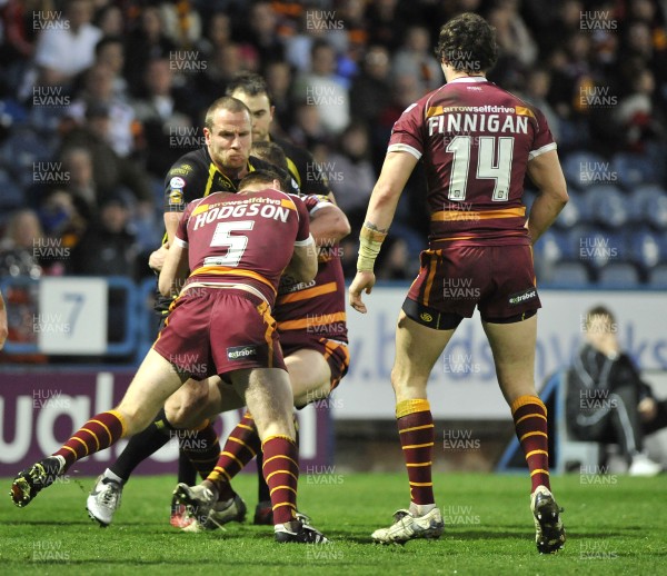 10.04.09.. Huddersfield Giants v Celtic Crusaders, engage Super League -  Crusaders Luke Dyer, centre, is tackled by David Hodgson, left and Kevin Brown. 