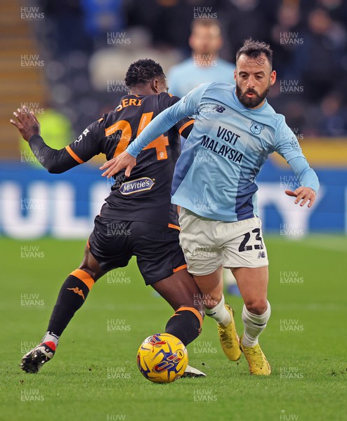161223 - Hull City v Cardiff City - Sky Bet Championship - Manolis Siopis of Cardiff and Jean Michael Seri of Hull City