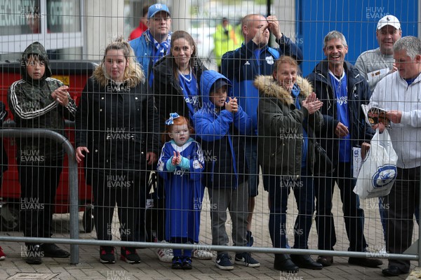 280418 - Hull City v Cardiff City - SkyBet Championship - A young Cardiff fan waits with others for the team to arrive