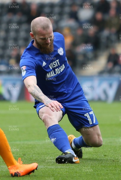 280418 - Hull City v Cardiff City - SkyBet Championship - Aron Gunnarsson of Cardiff City in visible pain as he goes injured