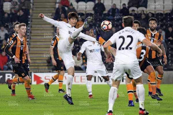 070117 - Hull City v Swansea City, The Emirates FA Cup Third Round - Ki Sung-Yueng of Swansea City competes for an aerial ball by Huw Evans Agency