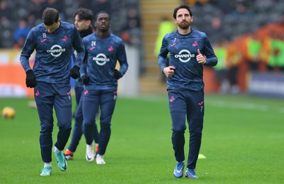 100224 - Hull City v Swansea City - Sky Bet Championship - Warm up led by Joe Allen of Swansea