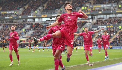 100224 - Hull City v Swansea City - Sky Bet Championship - Liam Cullen  of Swansea celebrates scoring the 1st goal with Ben Cabango of Swansea