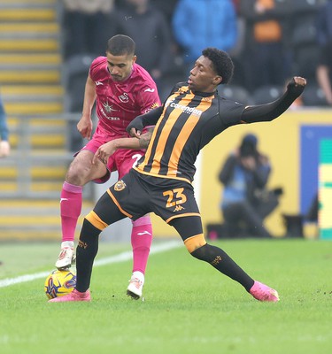 100224 - Hull City v Swansea City - Sky Bet Championship - Kyle Naughton of Swansea and Jaden Philogene of Hull City