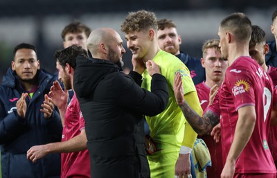 100224 - Hull City v Swansea City - Sky Bet Championship - Head Coach Luke Williams  of Swansea with Carl Rushworth of Swansea at the end of the match