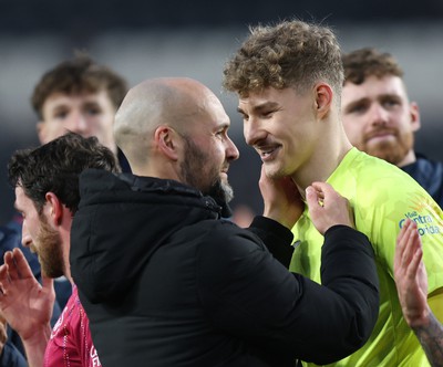 100224 - Hull City v Swansea City - Sky Bet Championship - Head Coach Luke Williams  of Swansea with Carl Rushworth of Swansea at the end of the match