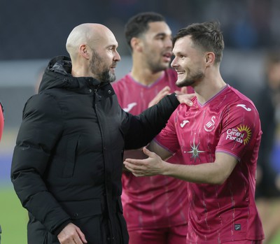 100224 - Hull City v Swansea City - Sky Bet Championship - Head Coach Luke Williams  of Swansea with goalscorer Liam Cullen  of Swansea at the end of the match