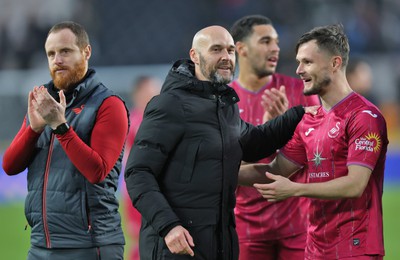 100224 - Hull City v Swansea City - Sky Bet Championship - Head Coach Luke Williams  of Swansea with goalscorer Liam Cullen  of Swansea at the end of the match