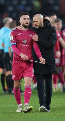 100224 - Hull City v Swansea City - Sky Bet Championship - Head Coach Luke Williams  of Swansea with Matt Grimes of Swansea at the end of the match