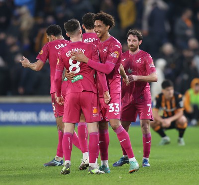 100224 - Hull City v Swansea City - Sky Bet Championship - Bashir Humphreys of Swansea and Matt Grimes of Swansea cele at the end of the match