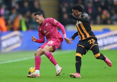 100224 - Hull City v Swansea City - Sky Bet Championship - Ronald of Swansea and Jaden Philogene of Hull City