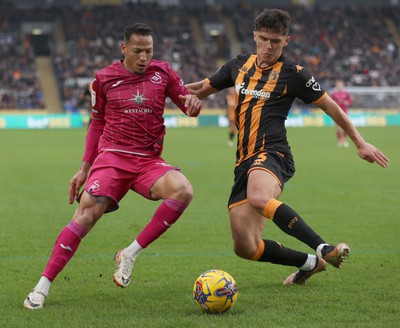 100224 - Hull City v Swansea City - Sky Bet Championship - Ronald of Swansea and Ryan Giles of Hull City