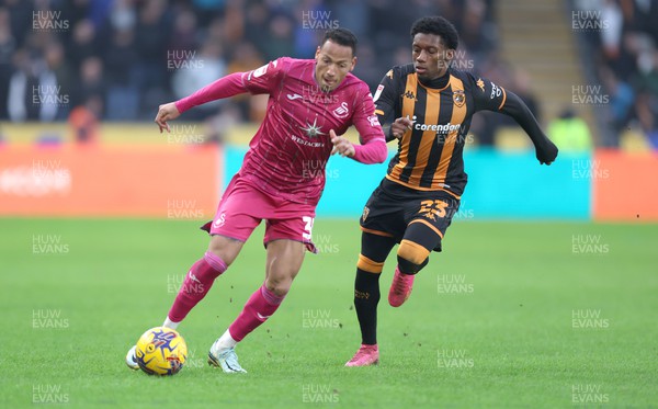 100224 - Hull City v Swansea City - Sky Bet Championship - Ronald of Swansea and Jaden Philogene of Hull City