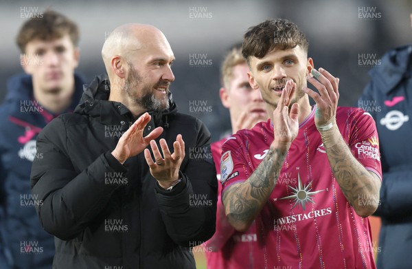 100224 - Hull City v Swansea City - Sky Bet Championship - Head Coach Luke Williams  of Swansea with Jamie Paterson of Swansea at the end of the match as they applaud the travelling fans