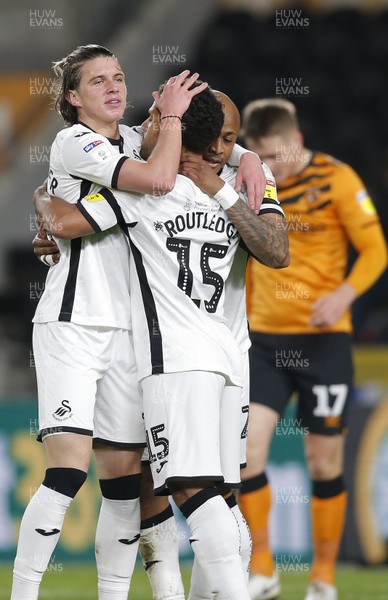 140220 - Hull City v Swansea City - Sky Bet Championship -  Wayne Routledge of Swansea celebrates his goal with Andre Ayew and Conor Gallagher