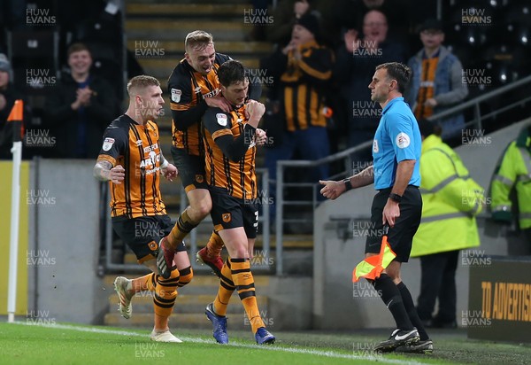 221218 - Hull City v Swansea City - Sky Bet Championship - Tommy Elphick of Hull City celebrates his goal with Jordy de Wijs and Jarrod Bowen on top 