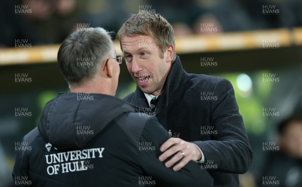 221218 - Hull City v Swansea City - Sky Bet Championship - Manager Graham Potter  of Swansea and Manager Nigel Adkins of Hull City shake hands and have a little friendly chat before the match 