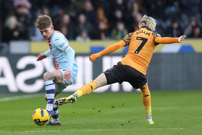 240126 - Hull City v Swansea City - Sky Bet Championship - Ethan Galbraith of Swansea and Liam Millar of Hull AFC