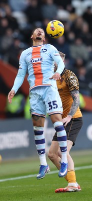 240126 - Hull City v Swansea City - Sky Bet Championship - Ronald of Swansea and Old McBurnie of Hull AFC