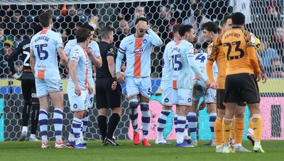 240126 - Hull City v Swansea City - Sky Bet Championship - Ben Cabango of Swansea is given a penalty decision against him