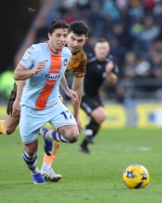 240126 - Hull City v Swansea City - Sky Bet Championship - Goncalo Franco of Swansea and John Egan of Hull AFC 