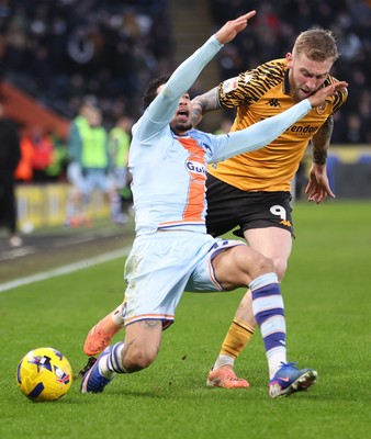 240126 - Hull City v Swansea City - Sky Bet Championship - Ronald of Swansea is fouled by Old McBurnie of Hull AFC