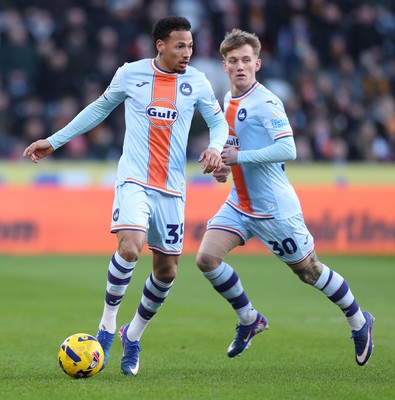 240126 - Hull City v Swansea City - Sky Bet Championship - Ronald of Swansea and Ethan Galbraith of Swansea