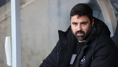 240126 - Hull City v Swansea City - Sky Bet Championship - Swansea manager Vitor Matos before the match in the dugout