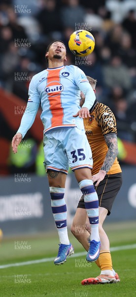 240126 - Hull City v Swansea City - Sky Bet Championship - Ronald of Swansea and Old McBurnie of Hull AFC