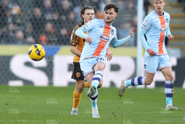 240126 - Hull City v Swansea City - Sky Bet Championship - Liam Cullen of Swansea and Regan Slater of Hull AFC